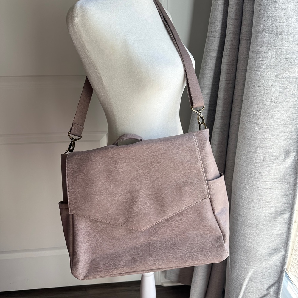 Elegant pink pebbled  Women's Bag/laptop backpack with a laptop case.
